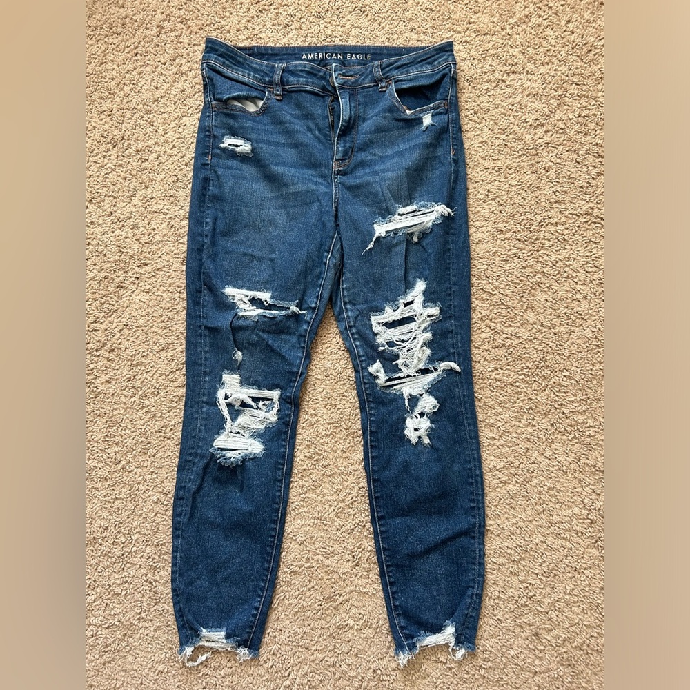 Distressed AE jeans with patches
